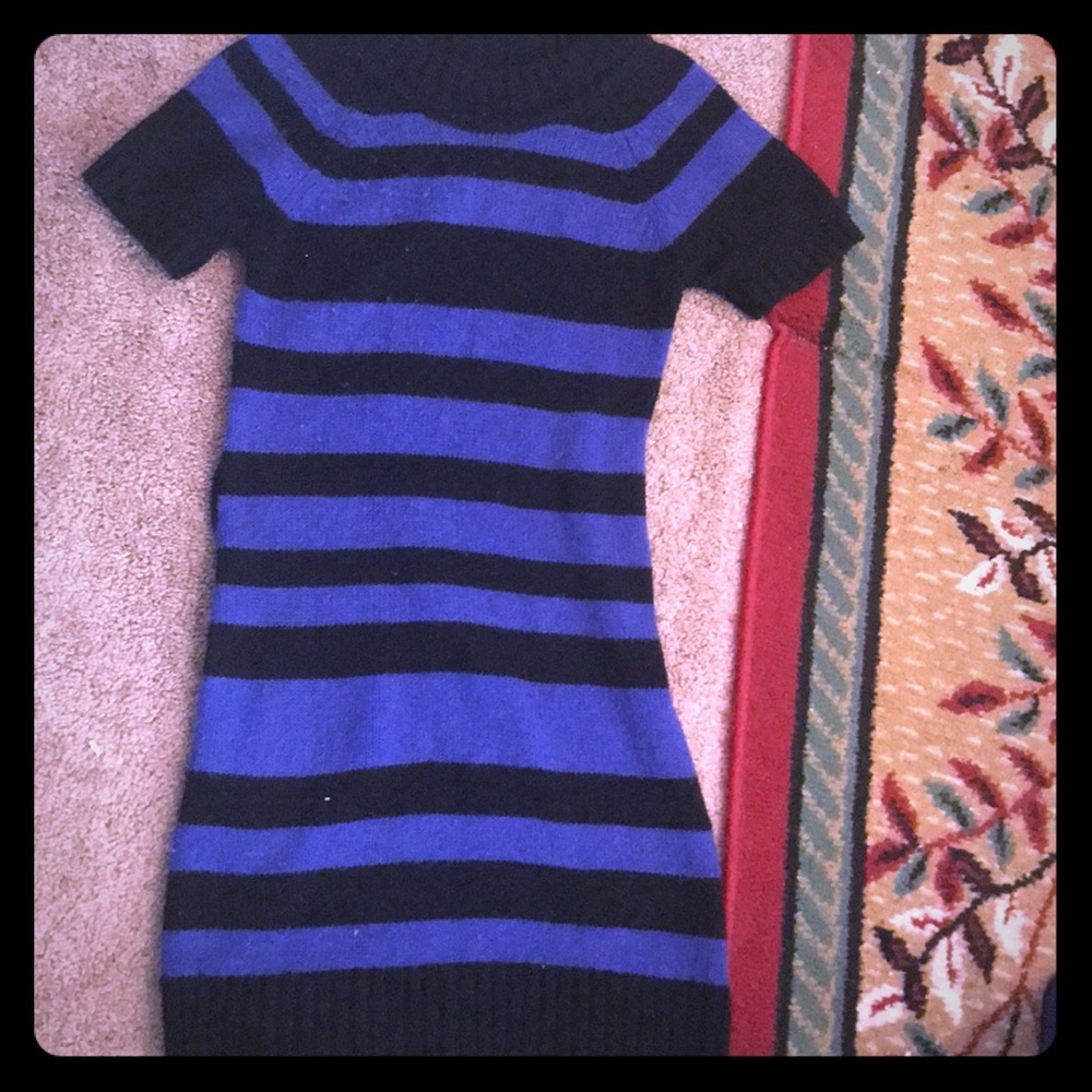 A dark purple and black sweater short sleeve dress